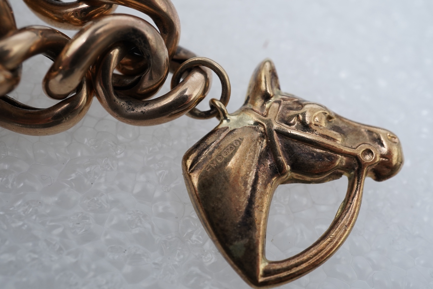 A 9ct gold charm bracelet